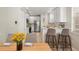 Kitchen featuring modern bar stools, lots of natural light, and stainless steel appliances at 1705 Saint Tropez Ct, Kissimmee, FL 34744