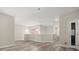 Upstairs loft area with wood floors, and light walls at 1705 Saint Tropez Ct, Kissimmee, FL 34744