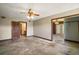 Bedroom featuring wood-paneled walls, ceiling fan, and mirrored closet doors at 17952 Lookout Hill Rd, Winter Garden, FL 34787
