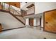 Bright foyer with staircase featuring wooden banisters at 17952 Lookout Hill Rd, Winter Garden, FL 34787