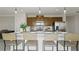 Beautiful kitchen with a white countertop island, seating, and pendant lighting at 1916 Diamond Head Cir, Lake Hamilton, FL 33851