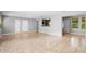 Spacious living room features neutral paint, large tile flooring, and lots of natural light at 1961 Winter Park Rd, Winter Park, FL 32789