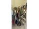 Walk-in closet featuring a hanging rod, built-in shelves, and ample storage space at 2011 E Esther St, Orlando, FL 32806