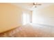 Spacious bedroom with neutral carpet and a sliding door, offering versatility and style for easy living at 2404 Bella Vista Dr, Davenport, FL 33897