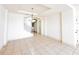 Spacious, open living area with staircase and large tile flooring at 2404 Bella Vista Dr, Davenport, FL 33897
