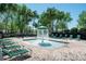 Community pool features a fountain and lounge chairs at 2543 Chapala Dr, Kissimmee, FL 34746