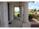 Covered front porch features large columns and a bench seat at 2543 Chapala Dr, Kissimmee, FL 34746