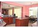 Kitchen area featuring granite counters, stainless steel appliances, and a dining nook at 2543 Chapala Dr, Kissimmee, FL 34746