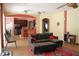 Bright and airy living room with hardwood flooring, open to kitchen, and comfortable seating at 2543 Chapala Dr, Kissimmee, FL 34746