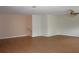 Large living room with hardwood flooring that connects with the home's interior and stairs at 2543 Chapala Dr, Kissimmee, FL 34746