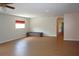 Comfortable living room featuring hardwood floors, recessed lighting, and a cozy bench at 2543 Chapala Dr, Kissimmee, FL 34746