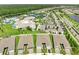 Aerial view of the community featuring a pool, clubhouse, tennis courts, and manicured landscaping at 2578 Cliff Way, St Cloud, FL 34771