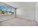 Bedroom featuring neutral carpet, a large window, and natural light at 2578 Cliff Way, St Cloud, FL 34771