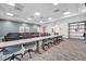 Well-lit classroom with tables, chairs, carpet flooring, and neutral walls, creating a comfortable learning environment at 2578 Cliff Way, St Cloud, FL 34771