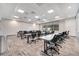 Classroom featuring rows of tables and chairs, with overhead lighting and windows, ideal for learning and collaboration at 2578 Cliff Way, St Cloud, FL 34771