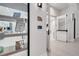 Hallway with a craft room through a glass door, providing organized spaces for art supplies and creative endeavors at 2578 Cliff Way, St Cloud, FL 34771