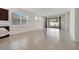 Open living space with tile flooring and a sliding glass door provides backyard access at 2578 Cliff Way, St Cloud, FL 34771