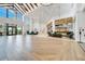 Expansive lobby featuring high ceilings, elegant chandeliers, and herringbone wood flooring at 2578 Cliff Way, St Cloud, FL 34771