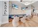 Cozy restaurant area featuring a custom wall mural, booth seating, and modern decor at 2578 Cliff Way, St Cloud, FL 34771