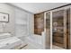 Modern bathroom featuring a walk-in shower and soaking tub at 2630 Sunrise Shores Dr, Kissimmee, FL 34747