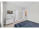 Bedroom featuring a dresser and doorways into other rooms at 2630 Sunrise Shores Dr, Kissimmee, FL 34747
