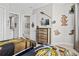 Nicely decorated twin bedroom with Harry Potter theme, TV, and a wooden dresser at 2630 Sunrise Shores Dr, Kissimmee, FL 34747