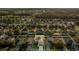 Birds eye view of a two-story home with a well-manicured lawn, highlighting its prime location in the neighborhood at 2657 Bullion Loop, Sanford, FL 32771