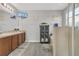 Bathroom featuring a double sink vanity, gray flooring, and a glass-enclosed shower at 2657 Bullion Loop, Sanford, FL 32771
