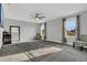 Spacious bedroom with lots of natural light, carpeted floors, and neutral paint at 2657 Bullion Loop, Sanford, FL 32771