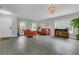 Spacious living room with wood floors, stylish furniture, and an elegant chandelier at 2657 Bullion Loop, Sanford, FL 32771