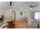 Open-concept living space with modern decor, a wood table, and comfortable seating at 2809 Redditt Rd, Orlando, FL 32822