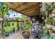 Cozy covered patio, complete with patio furniture and decorative plants at 2809 Redditt Rd, Orlando, FL 32822