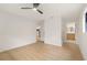 Spacious bedroom featuring modern flooring and easy access to the kitchen and bathroom at 2829 Lake Griffin Rd, Lady Lake, FL 32159