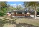Charming single-story home with brick accents and a well-maintained lawn at 2829 Lake Griffin Rd, Lady Lake, FL 32159