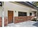 Inviting front door and brick exterior, creating a warm welcome to this charming home at 2829 Lake Griffin Rd, Lady Lake, FL 32159