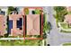 Aerial view showcases a single-Gathering home's roof, landscaping, and proximity to neighboring properties at 312 Partridge Pea Ln, Ocoee, FL 34761