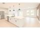 Spacious kitchen island with stainless steel dishwasher and sink at 313 Bass Ct, Kissimmee, FL 34759