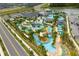 Resort-style community featuring a lazy river, pool, playground, and lush landscaping for luxury living at 3180 Paradox Cir # 304, Kissimmee, FL 34746