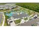 Aerial view of community amenities including a resort-style pool and clubhouse at 3180 Paradox Cir # 304, Kissimmee, FL 34746