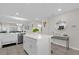 Bright and airy kitchen with a center island, modern appliances, and seamless flow into living spaces at 3180 Paradox Cir # 304, Kissimmee, FL 34746