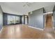 Bright living room with a view of stairs and large windows at 3222 Eagle Creek Ln, Kissimmee, FL 34746