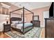 Charming bedroom with four-poster bed, dresser, and decorative accents at 3461 Michigan St, Lake Mary, FL 32746