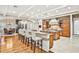 Open concept kitchen with view to dining area and spiral staircase at 3461 Michigan St, Lake Mary, FL 32746