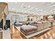 Expansive living room featuring hardwood floors, recessed lighting, and neutral tones at 3461 Michigan St, Lake Mary, FL 32746