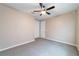 Bedroom with plush carpet, fan, and closet at 3651 Nw 56Th Ave, Ocala, FL 34482