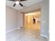 Open dining area with tile flooring and view of the adjacent living room and kitchen at 3651 Nw 56Th Ave, Ocala, FL 34482