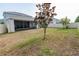Backyard with a patio and fenced yard at 4007 Meandering Bay Dr, Apopka, FL 32712