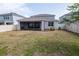 Fenced backyard featuring covered patio at 4007 Meandering Bay Dr, Apopka, FL 32712