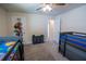 Bedroom with bunk beds and multiple doors leading to closets and other rooms at 4007 Meandering Bay Dr, Apopka, FL 32712