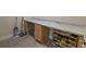 Functional mudroom with marble counter, cabinet, and shoe shelves providing ample storage at 4007 Meandering Bay Dr, Apopka, FL 32712
